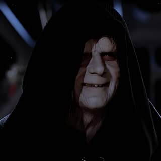 Darth Vader appearing in Star Wars: The Force Awakens, wearing a hoodie and smiling. Also in Star Wars: The Empire Strikes Back.