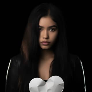 https://s mj run/ODm_3quG0FE https://s mj run/0Okyqt6vpa8 20 year old indigenous supermodel holding white paper heart