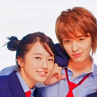 two young asian people in school uniforms